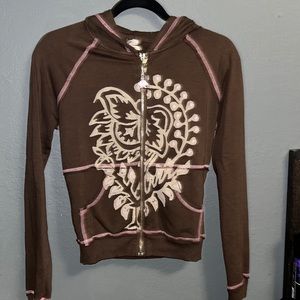 pink lotus track suit in brown